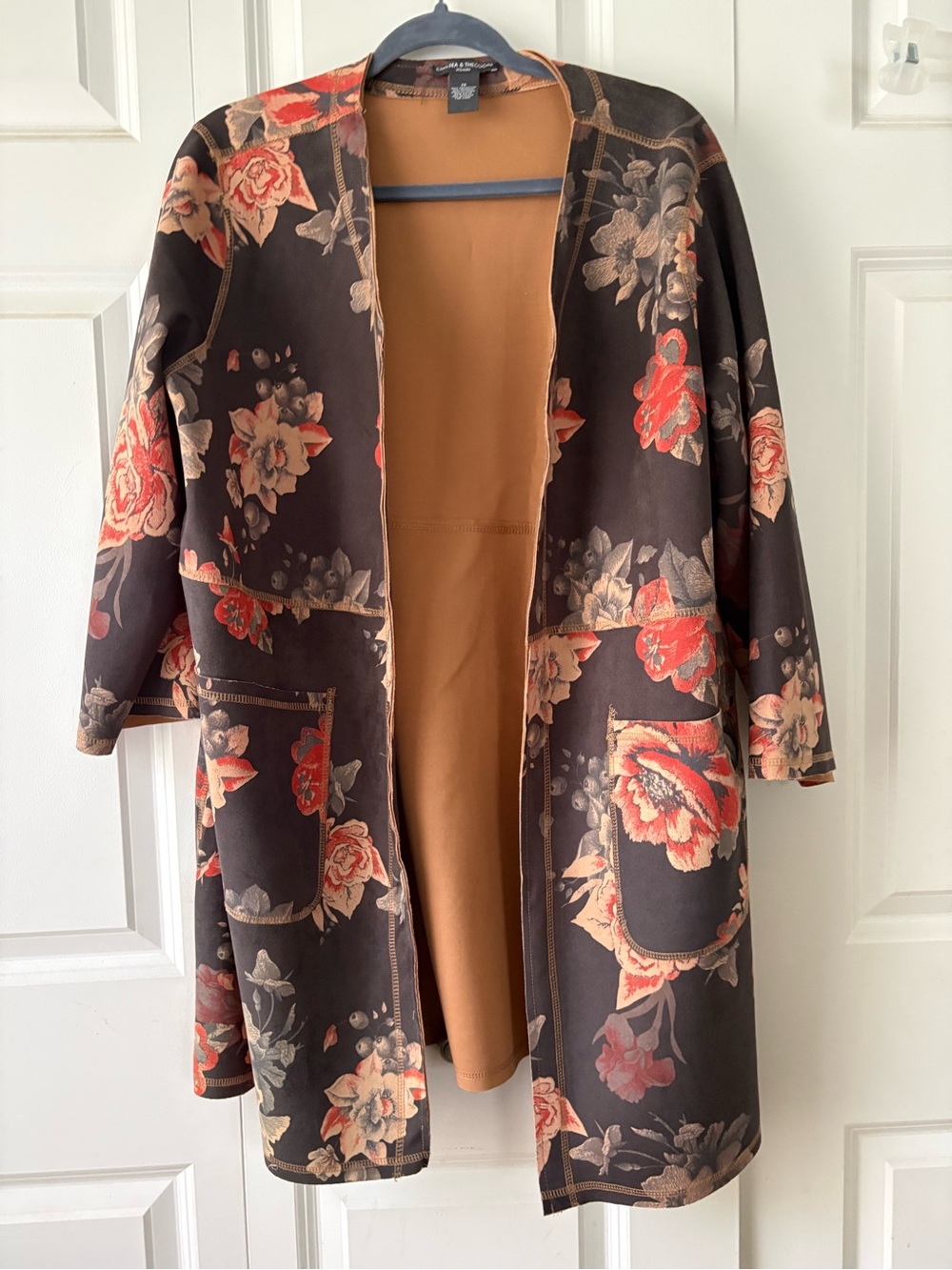 Chelsea and Theodore duster top